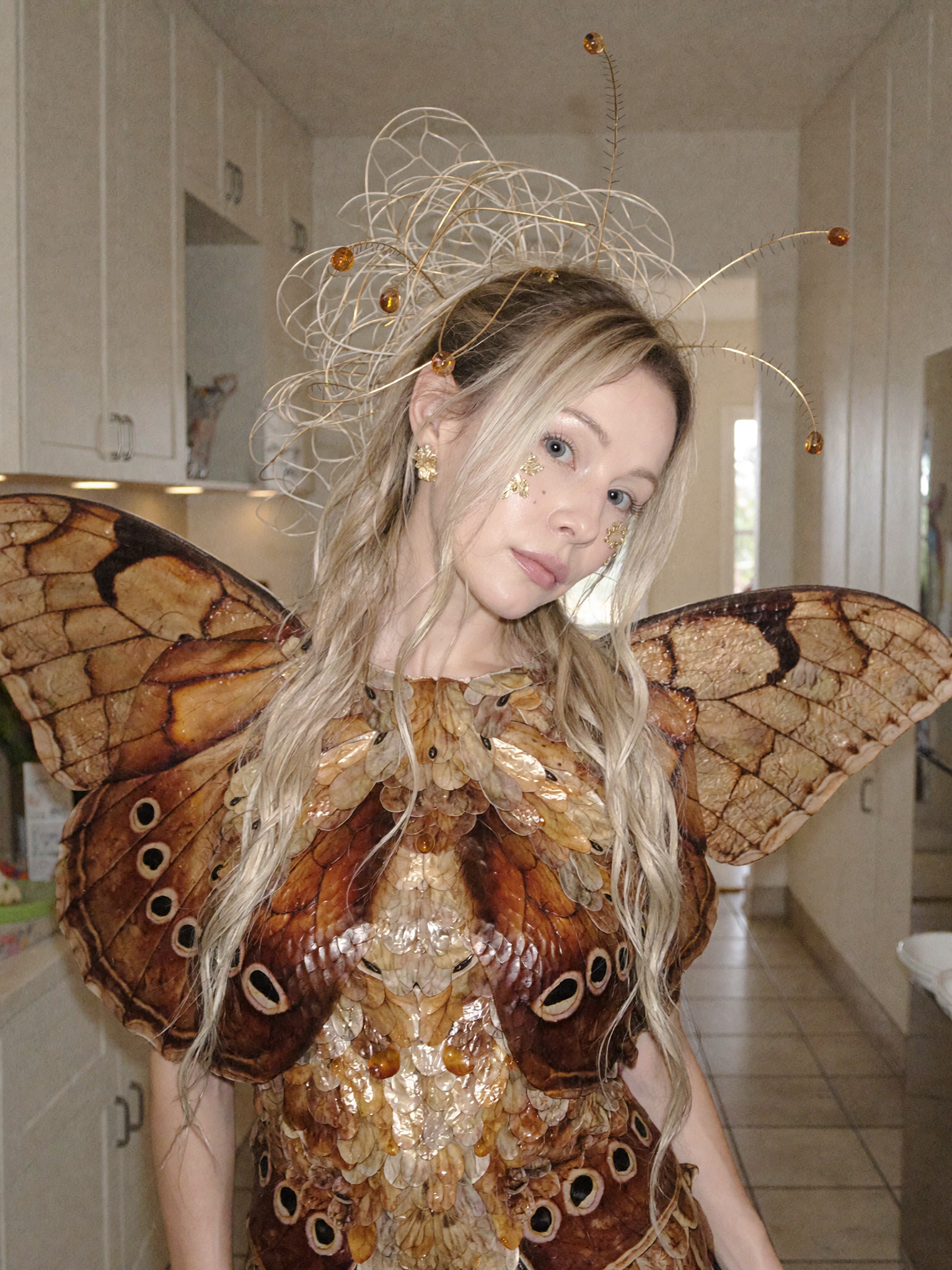 Creative portrait with butterfly wing costume design