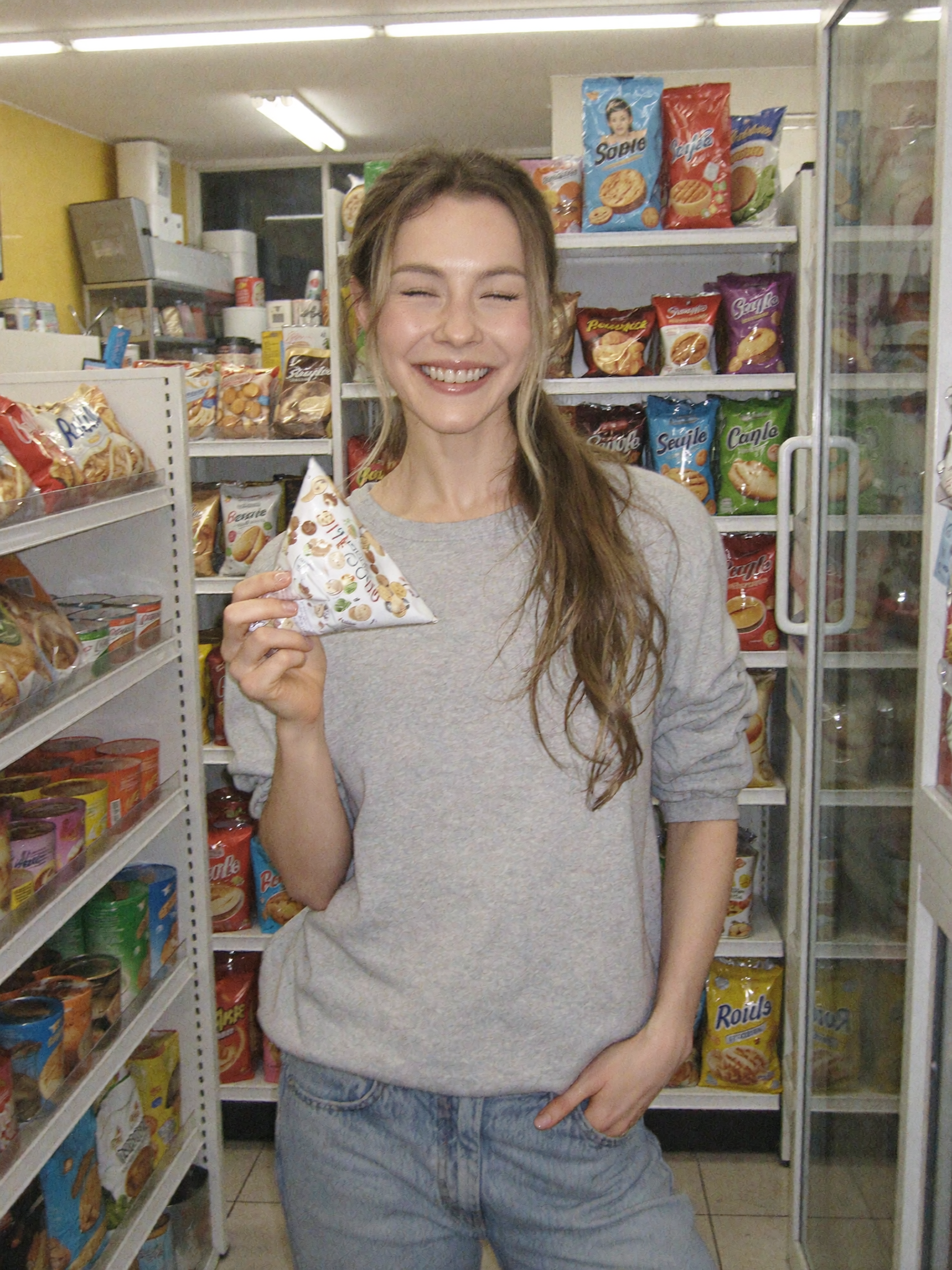 Candid portrait with warm smile in everyday setting